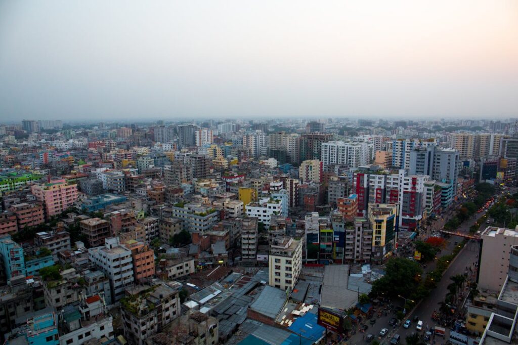 Skyline of Dhaka, Bangladesh, showcasing modern high-rise buildings and bustling streets, reflecting the nation's dynamic economic progress and development in emerging markets.